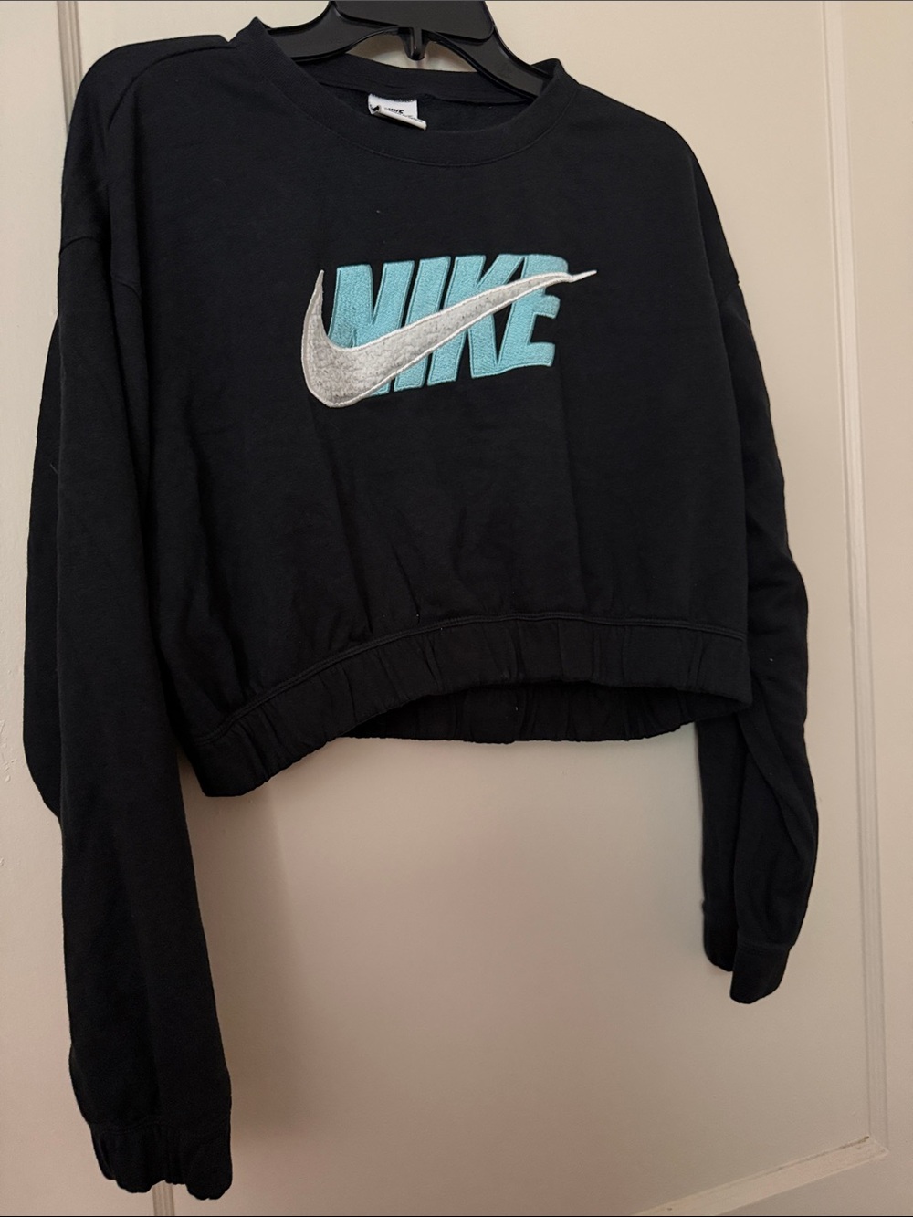 Nike Black Cropped Sweatshirt with Teal Logo and Silver Swoosh